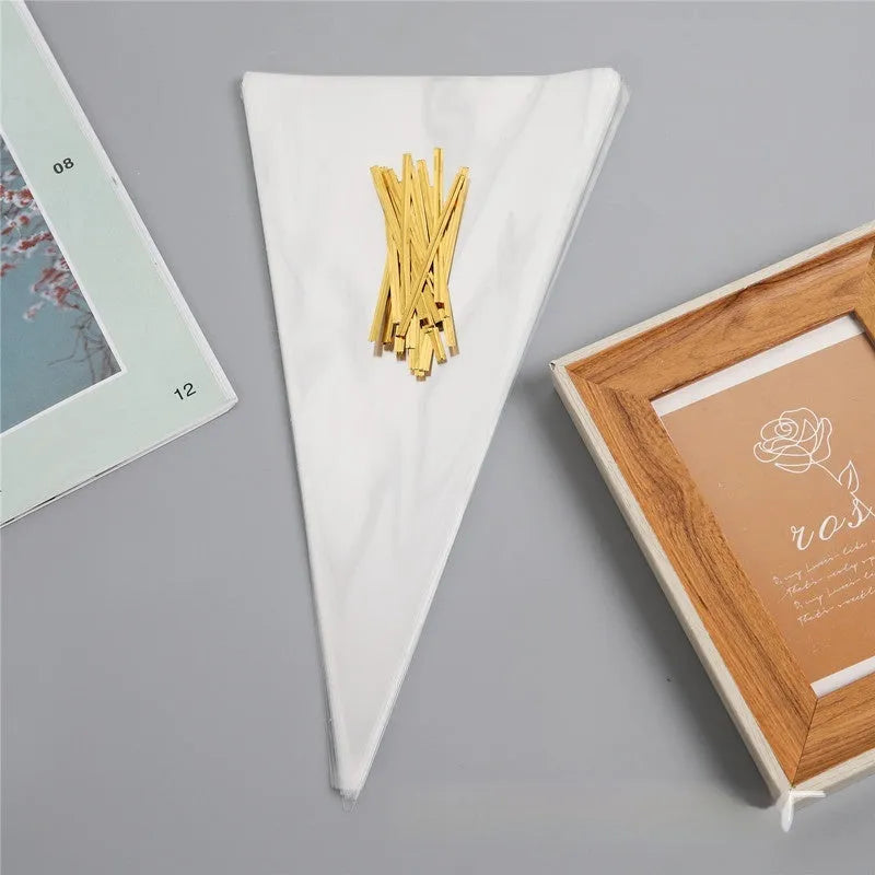 Clear triangle-shaped plastic packaging bag with a silver tie wire closure, shown in three different sizes.