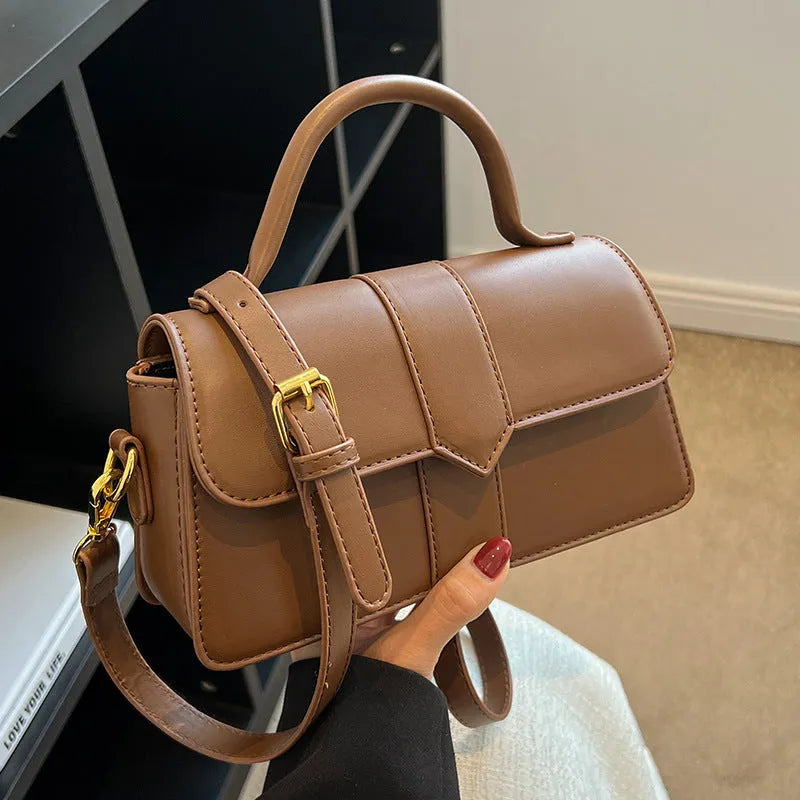 Women's PU messenger bag in horizontal square shape with sandwich pocket and file organiser interior