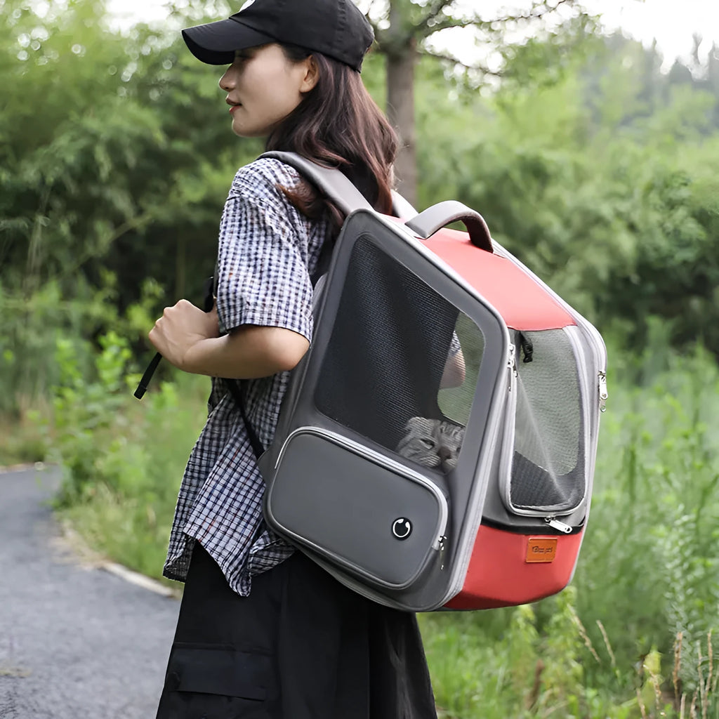 Portable pet carrier backpack with 18L expandable capacity in black nylon for cats and dogs