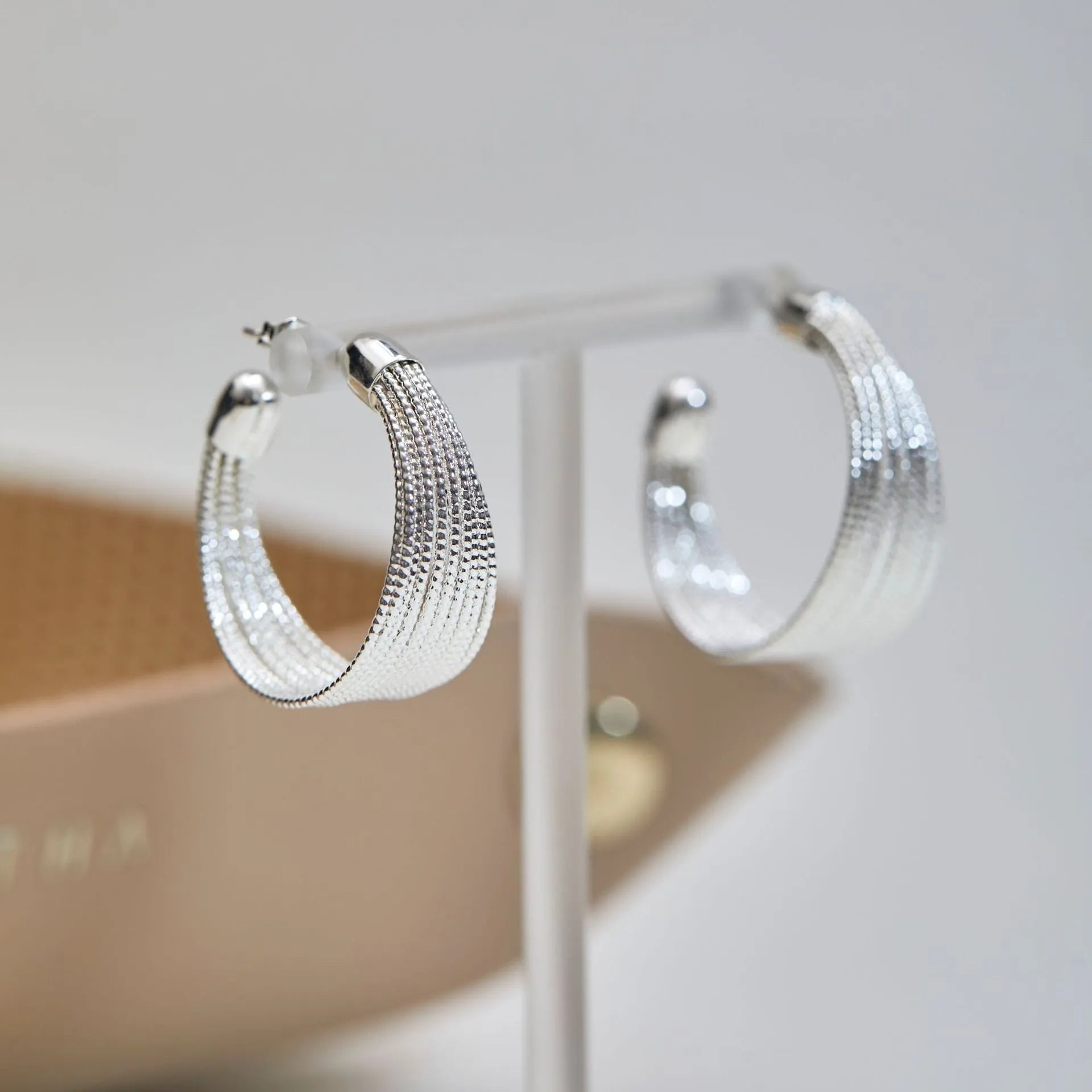 Geometric copper earrings with multi-layer bracelet design in gold and silver electroplated finishes