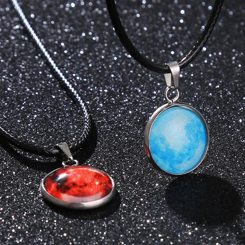 Alloy necklace with luminous glass pendant showing Christmas moon night sky and constellation design.
