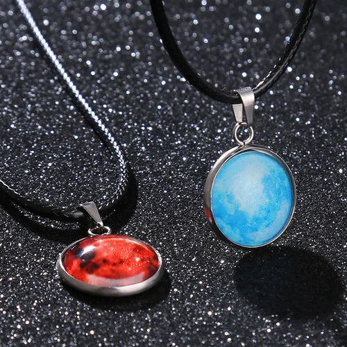 Alloy necklace with luminous glass pendant showing Christmas moon night sky and constellation design.
