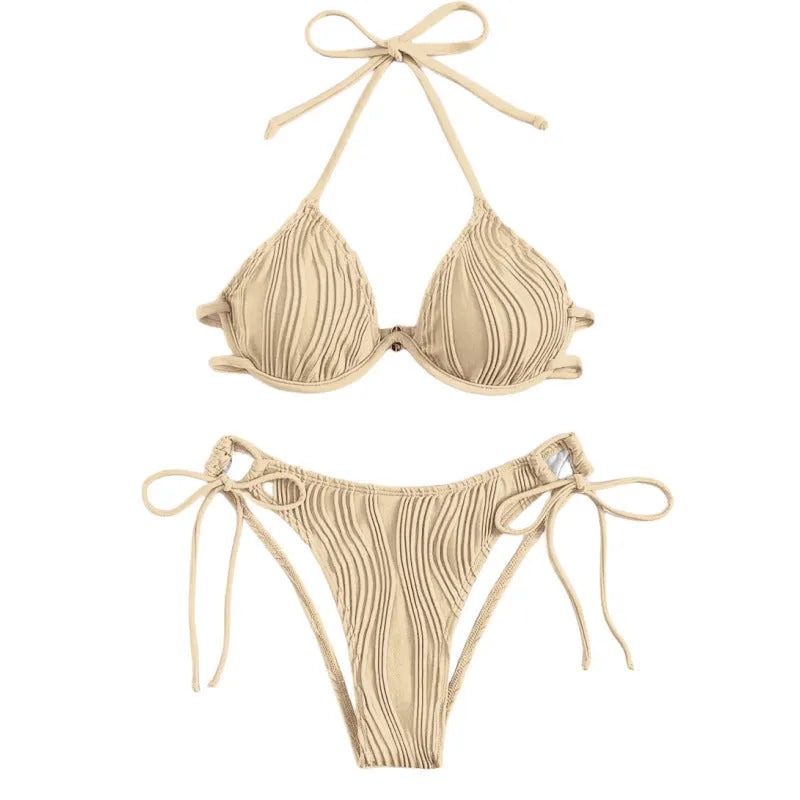 Women's apricot coloured split bikini swimsuit with steel wire bracket support.