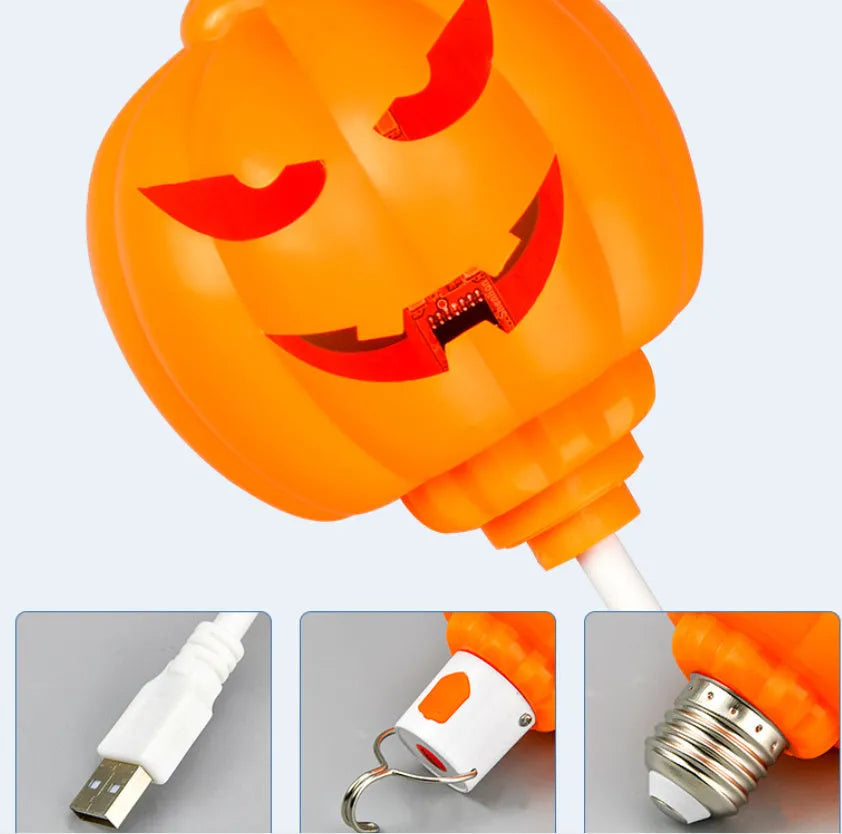 Plastic pumpkin decorative lamp with USB charging cable and yellow or purple light options
