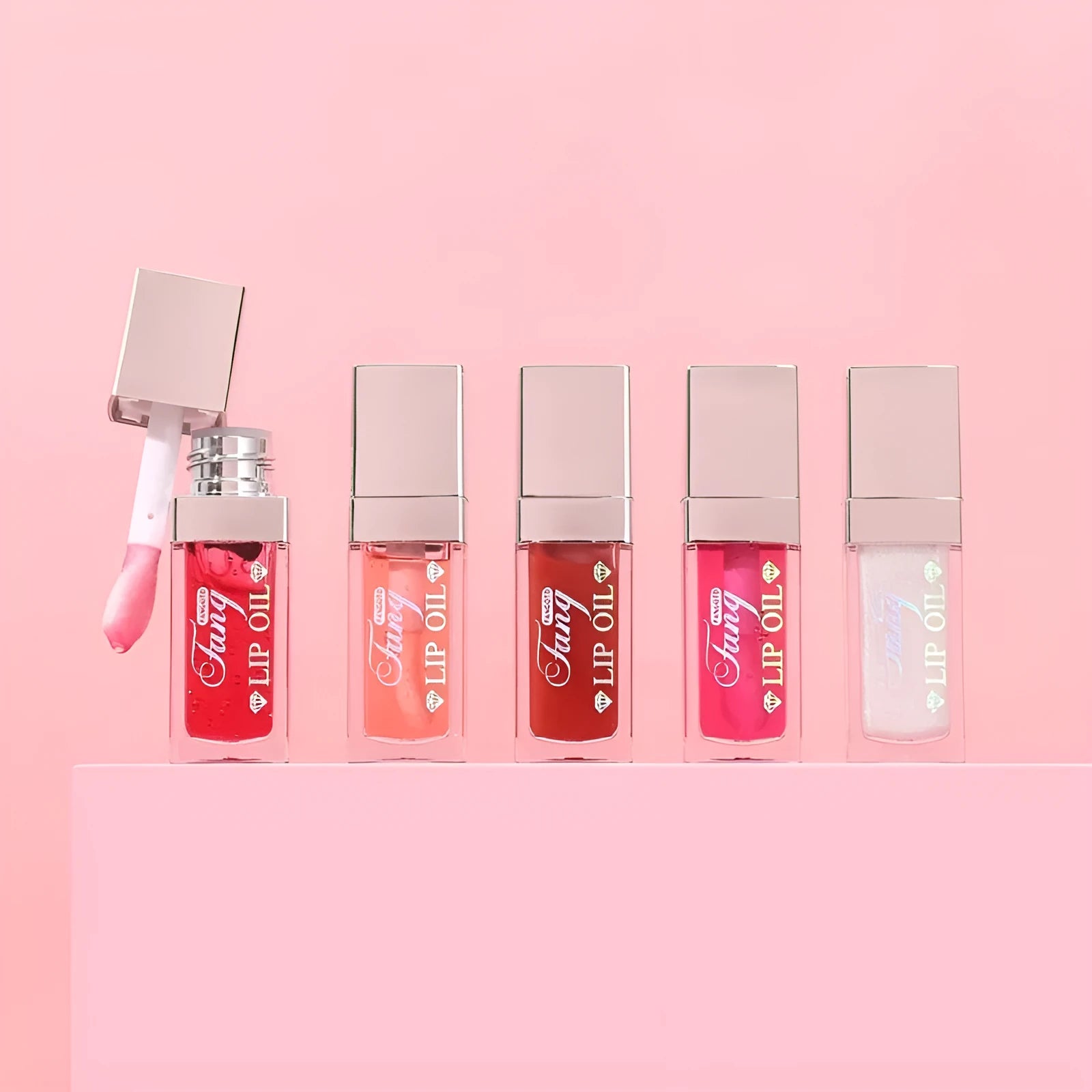 Mint flavour lip gloss stick in twist-up tube showing sheer glossy finish on lips