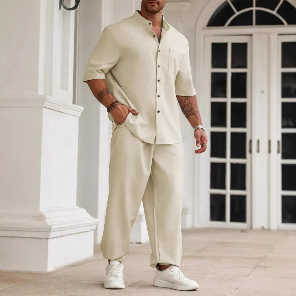 Men's casual apricot-coloured cotton linen short-sleeve shirt and trouser set laid flat.