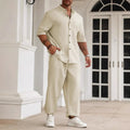 Men's casual apricot-coloured cotton linen short-sleeve shirt and trouser set laid flat.