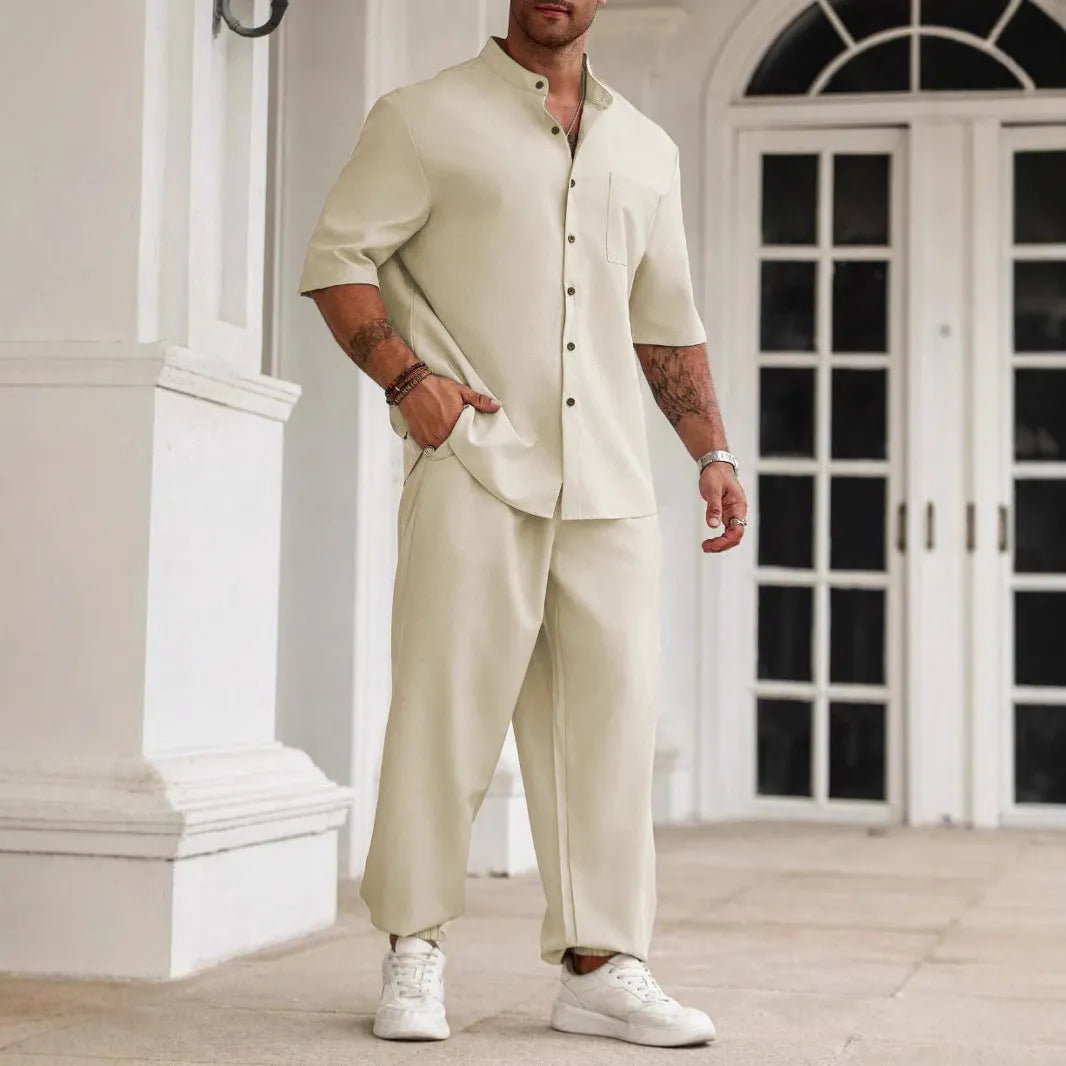 Men's casual apricot-coloured cotton linen short-sleeve shirt and trouser set laid flat.