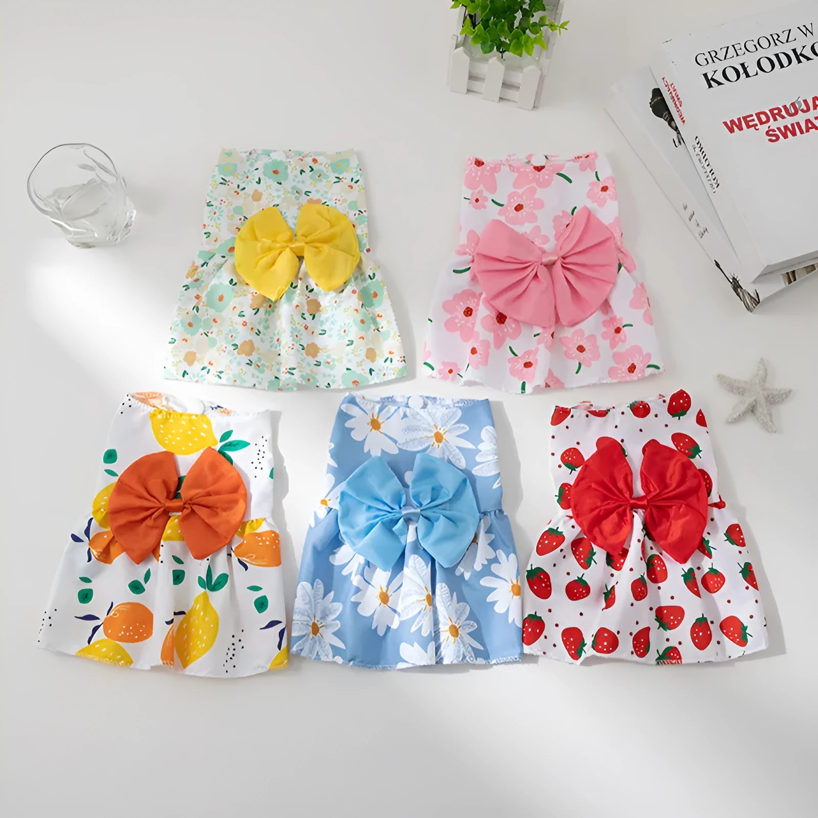 Orange bow floral butterfly pet dress with knot fastening on small dog