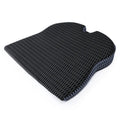 Solid colour memory foam cushion with an attached strap, shown on a car seat.