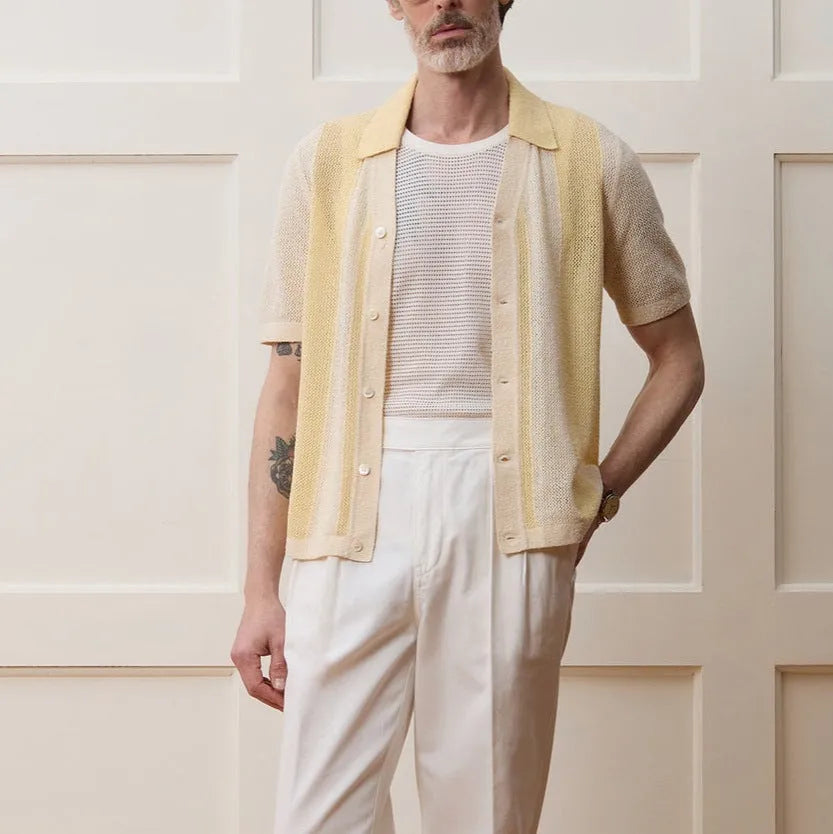 Yellow men's polo shirt with asymmetric design and short sleeves made from Tencel fabric
