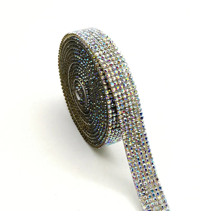 Self-adhesive glass water drill strip in AB colour and white showing electroplated finish