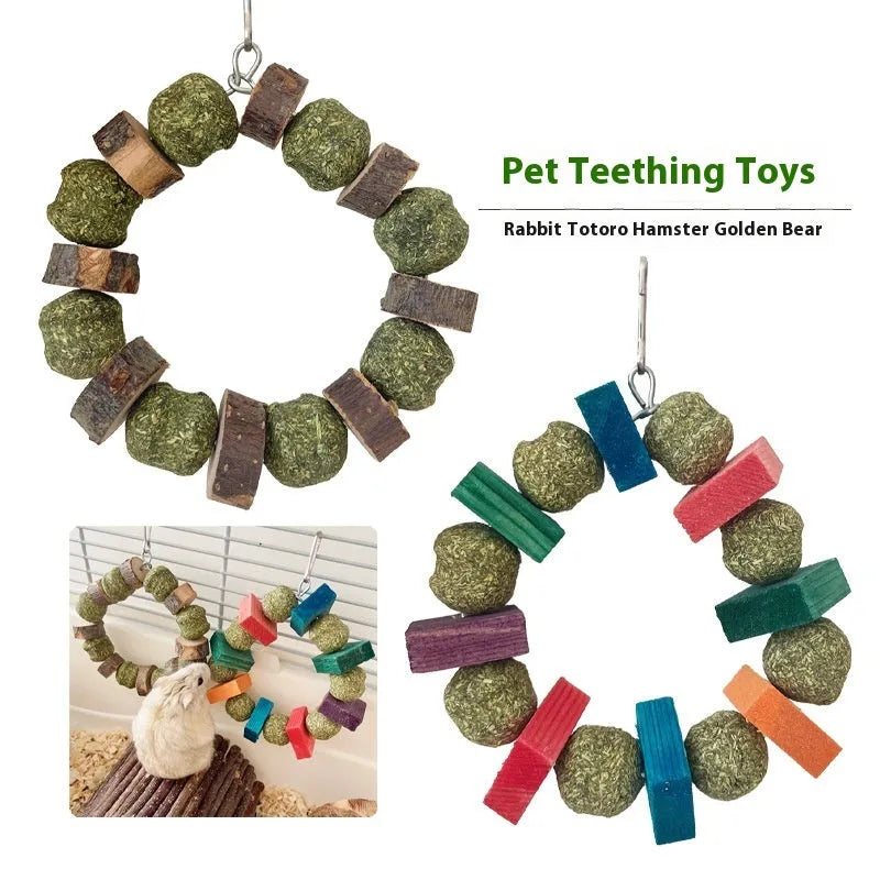 Applewood and straw ball ring chew toy for hamsters, guinea pigs, and rabbits on a white background.