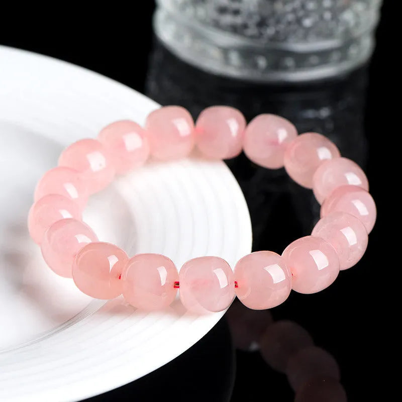 Pink crystal barrel bead bracelet with geometric shaped 8-10mm beads