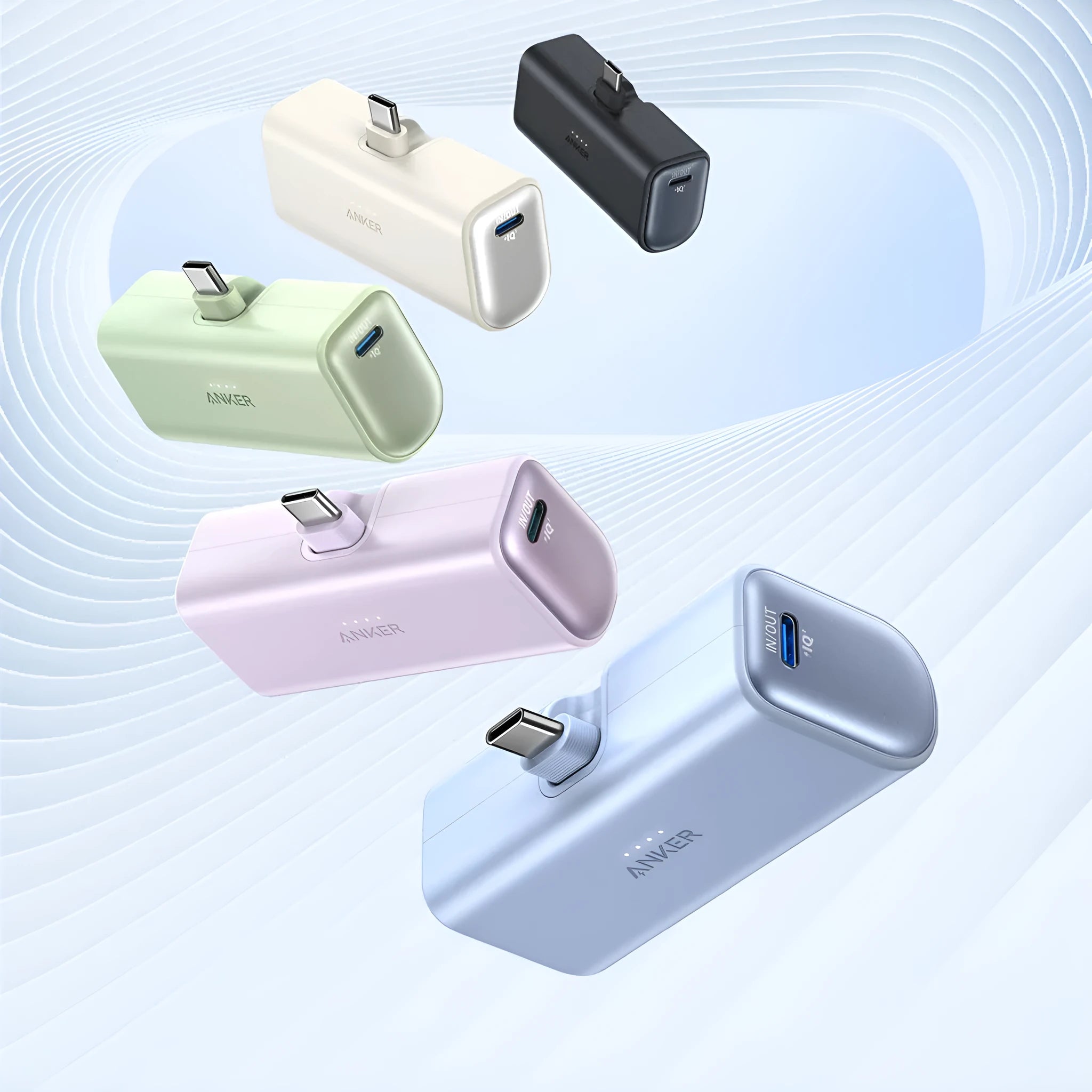 Small capsule-shaped power bank in multiple colours with a foldable USB-C cable.