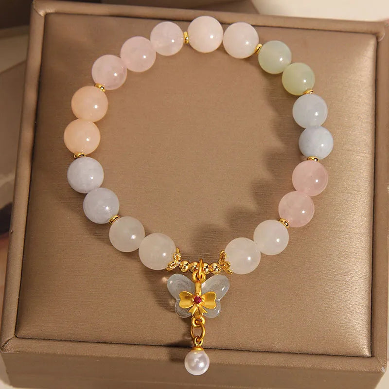 Morganite bracelet with colourful natural stone butterfly pendant on crystal bracelet