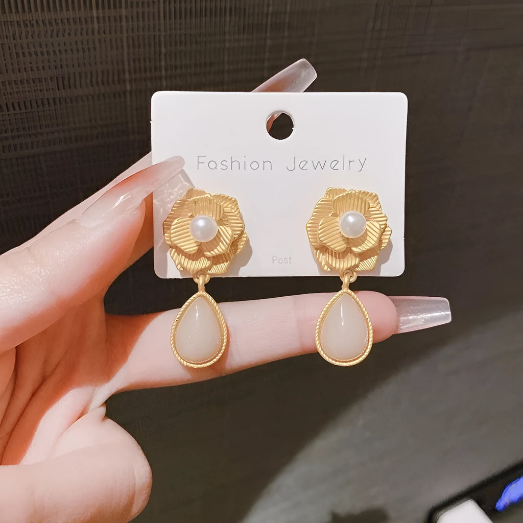 Gold colour flower stud earrings with rose pearl centre and opal stone details