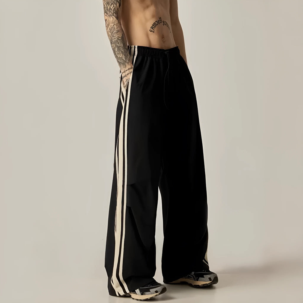 Men's black wide leg climbing trousers with high waist and straight leg design