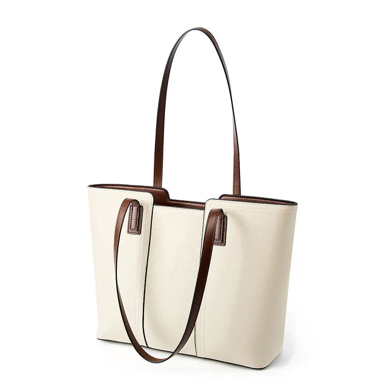 Women's genuine leather commuter shoulder bag with multiple internal zippered compartments in black colour