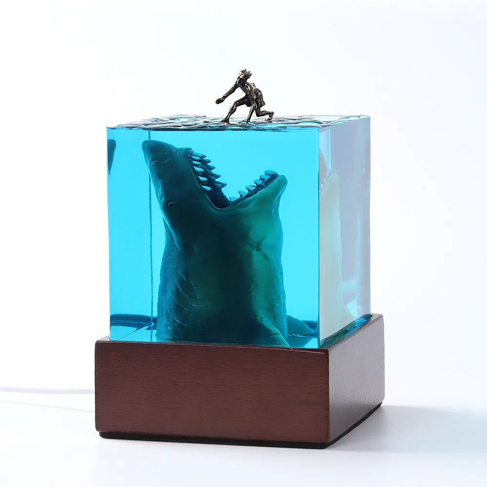 Clear epoxy resin shark surfer night light ornament with LED, modern design in 5cm or 8cm size.
