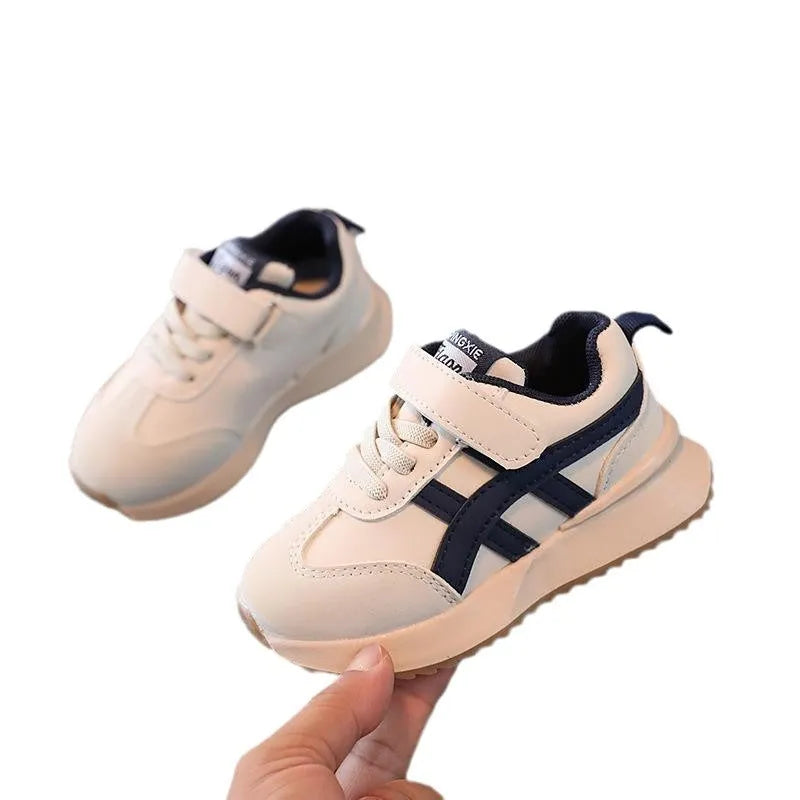 Children's Velcro sneakers in synthetic leather with rubber sole, shown in beige colour