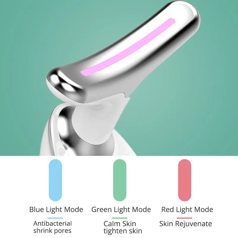 White EMS thermal neck massager with LED lights, shown with USB cable and moisturiser box