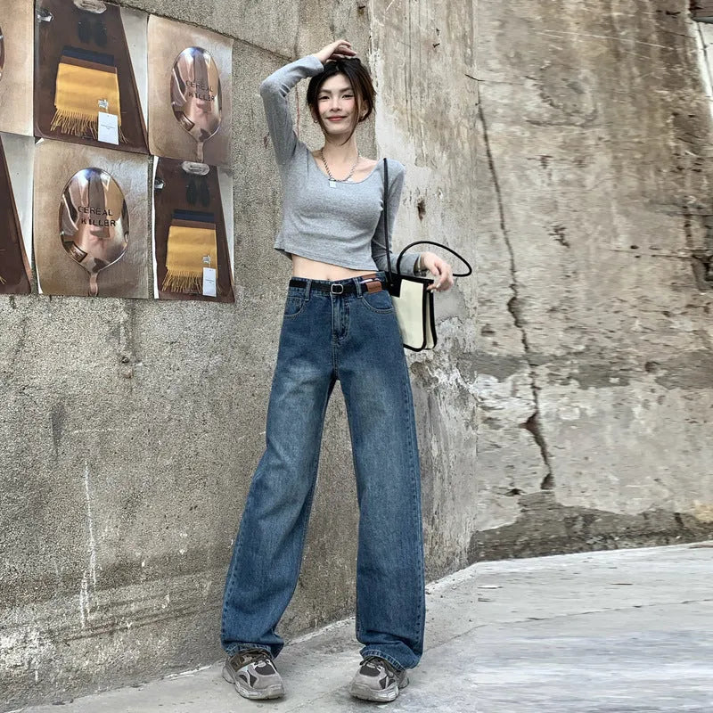 Women's high-waist straight leg jeans in retro blue denim showing three length variations