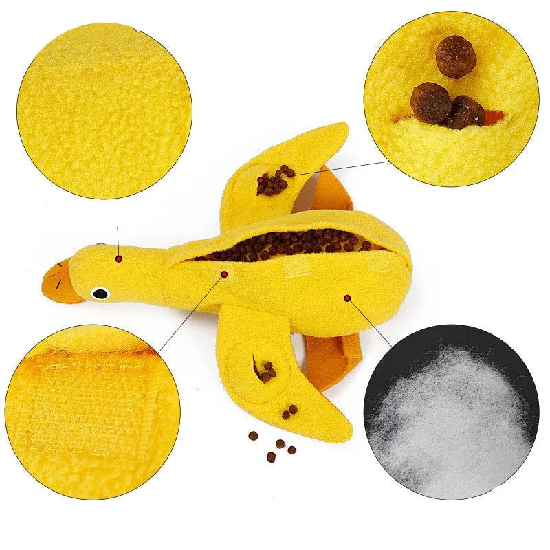 Yellow plush duck dog toy with treat compartments and squeaker for training