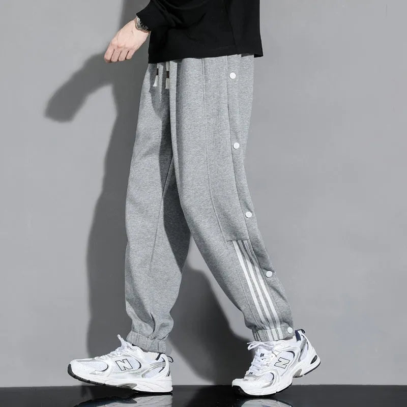 Men's loose grey sweatpants with ankle ties and belt, cotton blend fabric for autumn sports wear