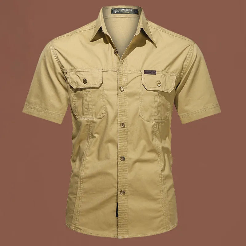 Men's short sleeve cotton work shirt in a loose fit, shown in army green colour.