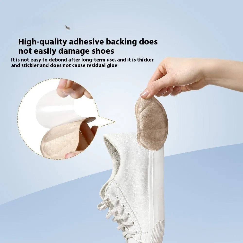 Three pairs of camel-coloured suede heel cushion pads with adhesive backing
