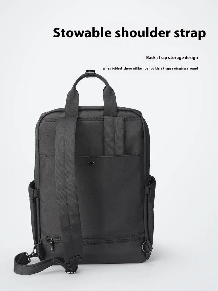 Elegant black Oxford cloth computer backpack with 20-35 litre capacity and a laptop compartment.