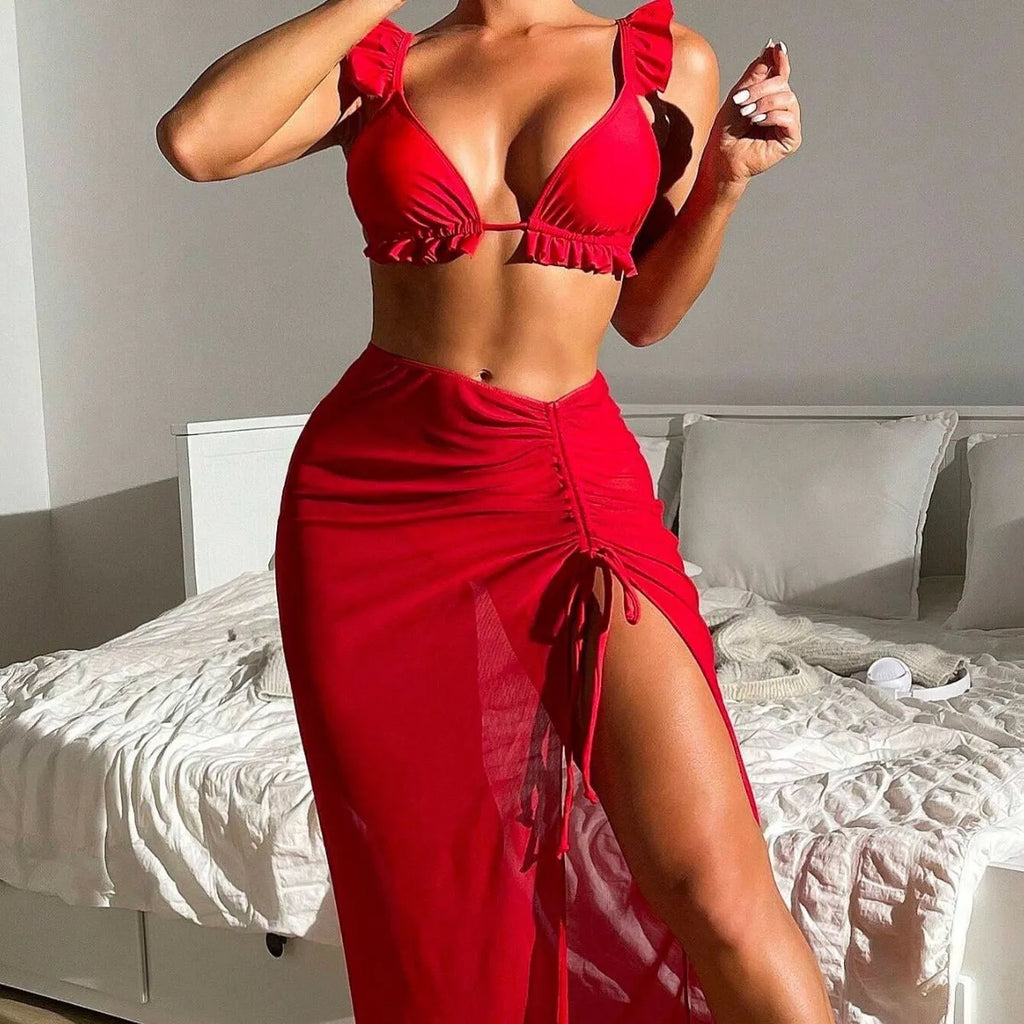 Women's three-piece split swimsuit set with skirt style top and pants in colourful polyester fabric
