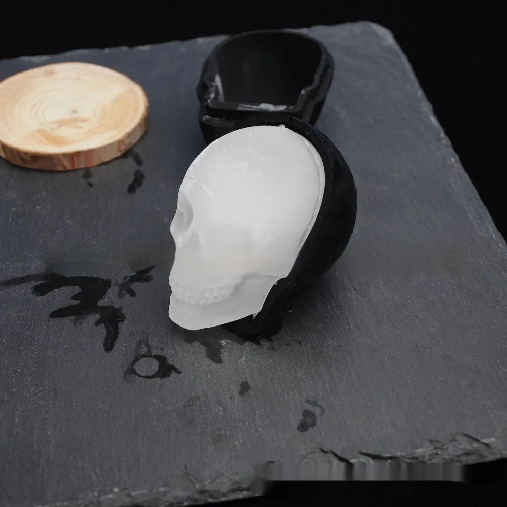 Halloween skull ice cube tray made from food-grade silicone measuring 5.8 by 8.5 by 7 cm
