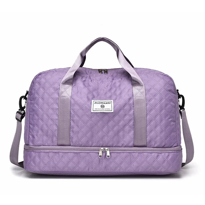 Oxford cloth travel bag with 36-55 litre capacity for leisure trips and buggy use in solid colour options