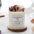 Dried flower decorative aromatherapy candle with nine scent options and wooden chip base