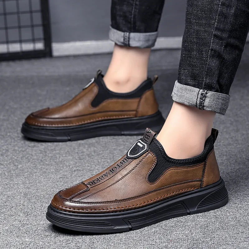 Men's casual leather shoes with round toe in black and brown solid colours