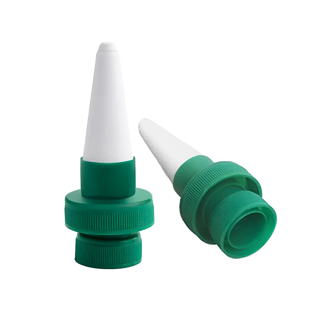 Green ceramic water dripper device for use with a cola bottle for automatic plant watering.