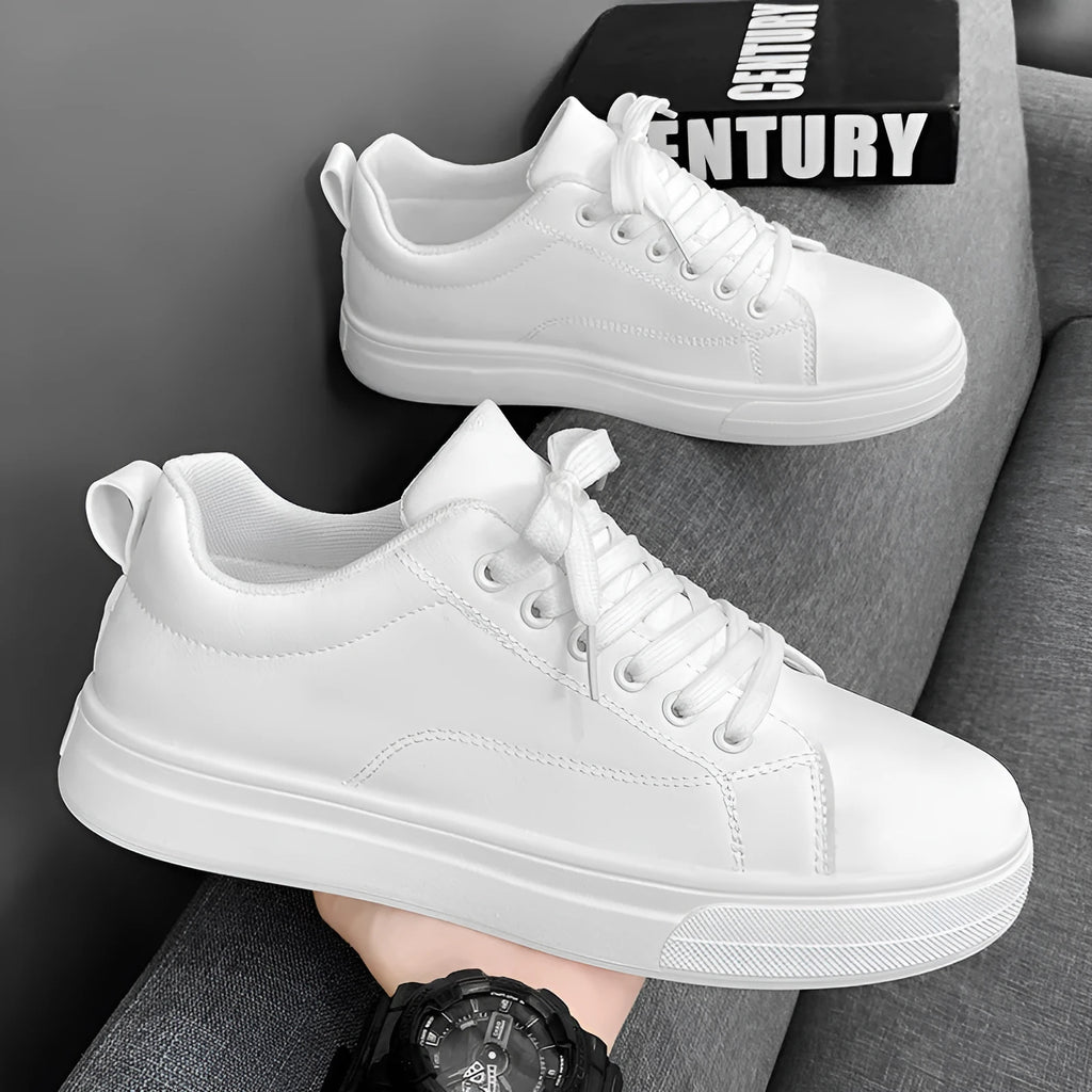 Men's low-top Korean-style sneakers in white and black colour options with round toe and flat rubber sole