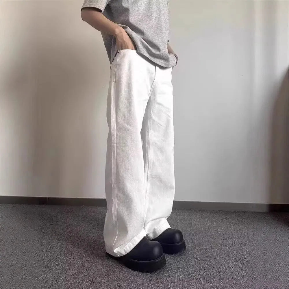 Men's white straight leg denim jeans with mid waist and zipper fly