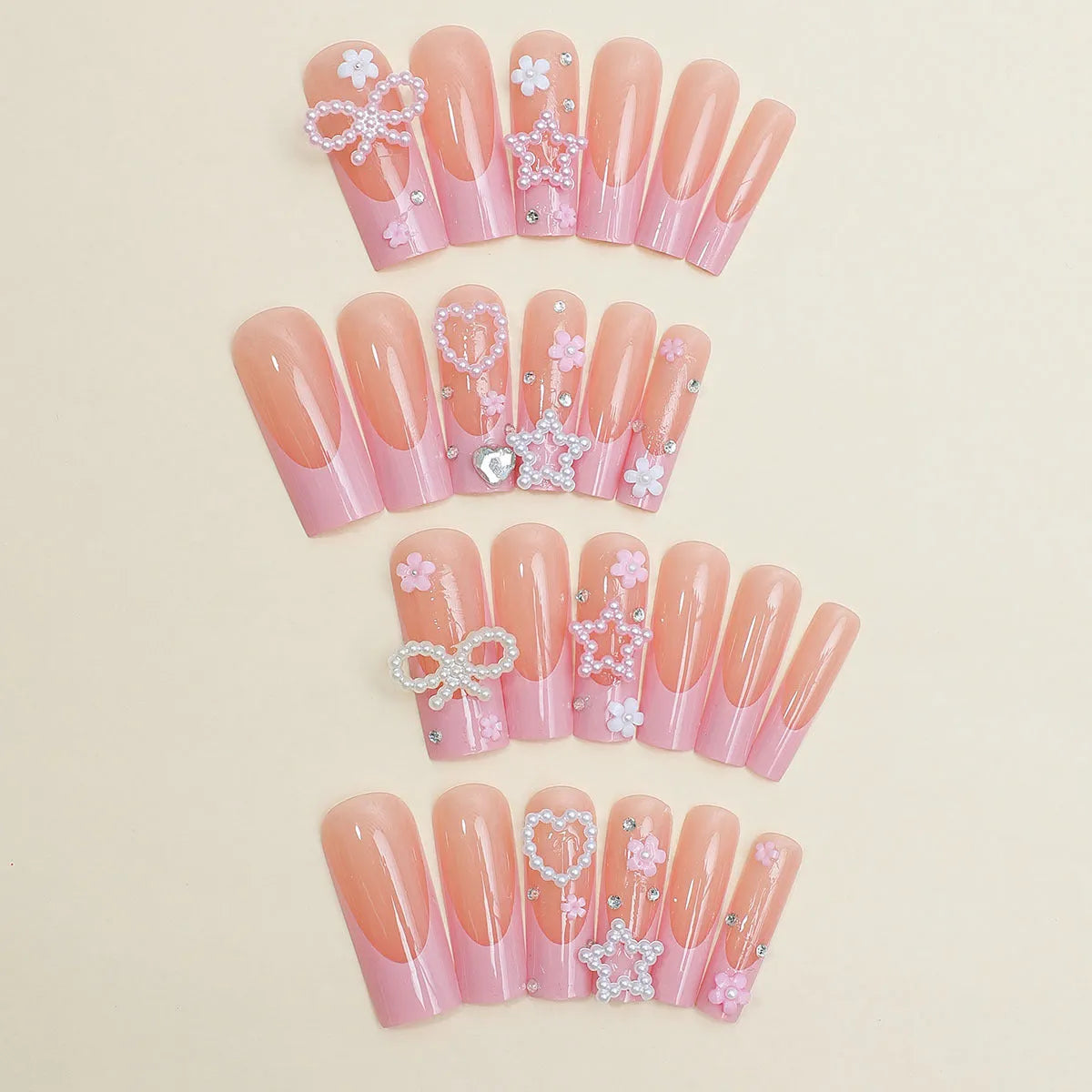 Super long pointed false nails with French spot drill bow design and love pattern in colour XB-70-48.