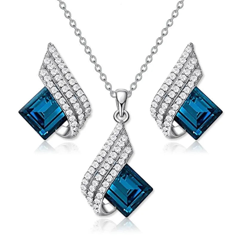 Necklace and earring jewellery set with cross chain design and alloy pendant