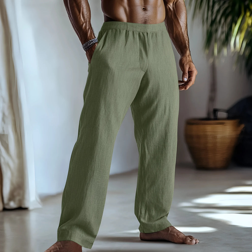 Straight-leg casual trousers in cotton and linen fabric, shown in a light green colour with visible side pockets.
