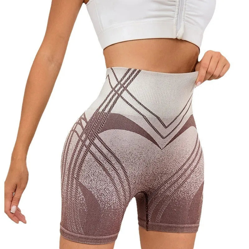 Women's high waisted gradient fitness shorts in black, suitable for running and yoga.
