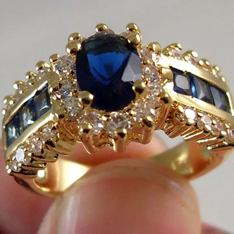 Personalised unisex ring with sunflower blue diamond or square-cut blue and purple zircon designs.