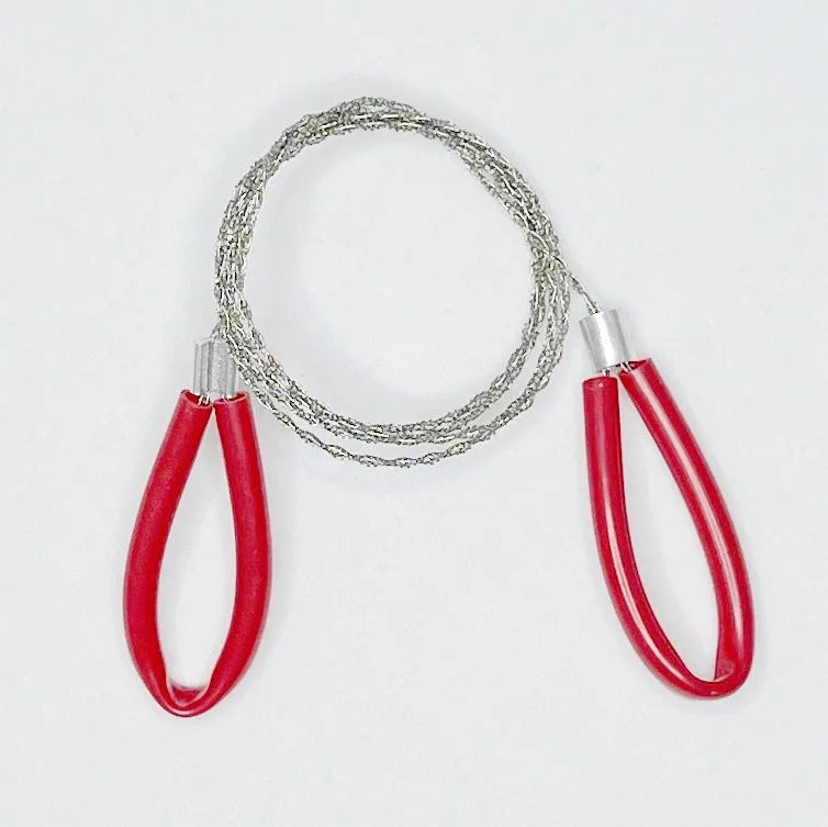 German stainless steel survival wire saw with black leather hand case, showing the four-strand cutting wire.
