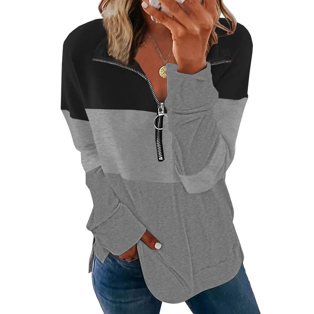 Women's loose long-sleeved leopard print sweater in a green colour variant on a hanger.