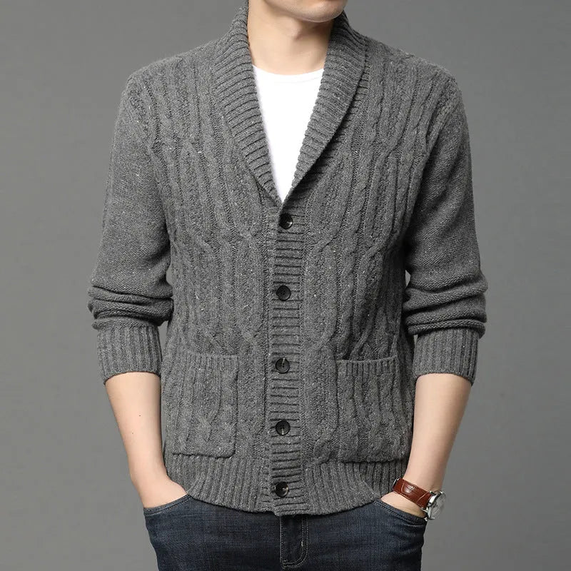 Man wearing a grey Korean style jacquard patterned knitted cardigan jacket.