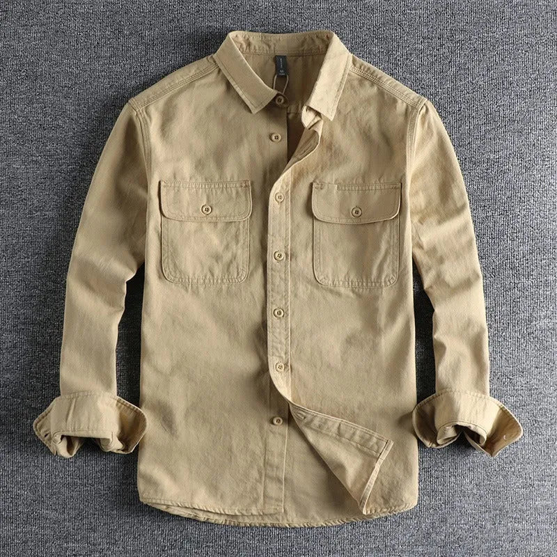 Men's loose long sleeve polyester shirt in cardigan style on a hanger, shown in light grey colour