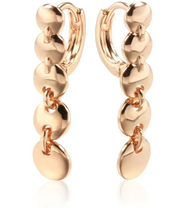 Gold-coloured woven copper round circle drop earrings with retro design.
